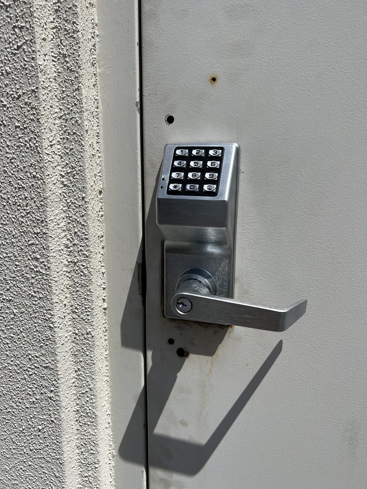 Trilogy keypad lever lock installed on an exterior door