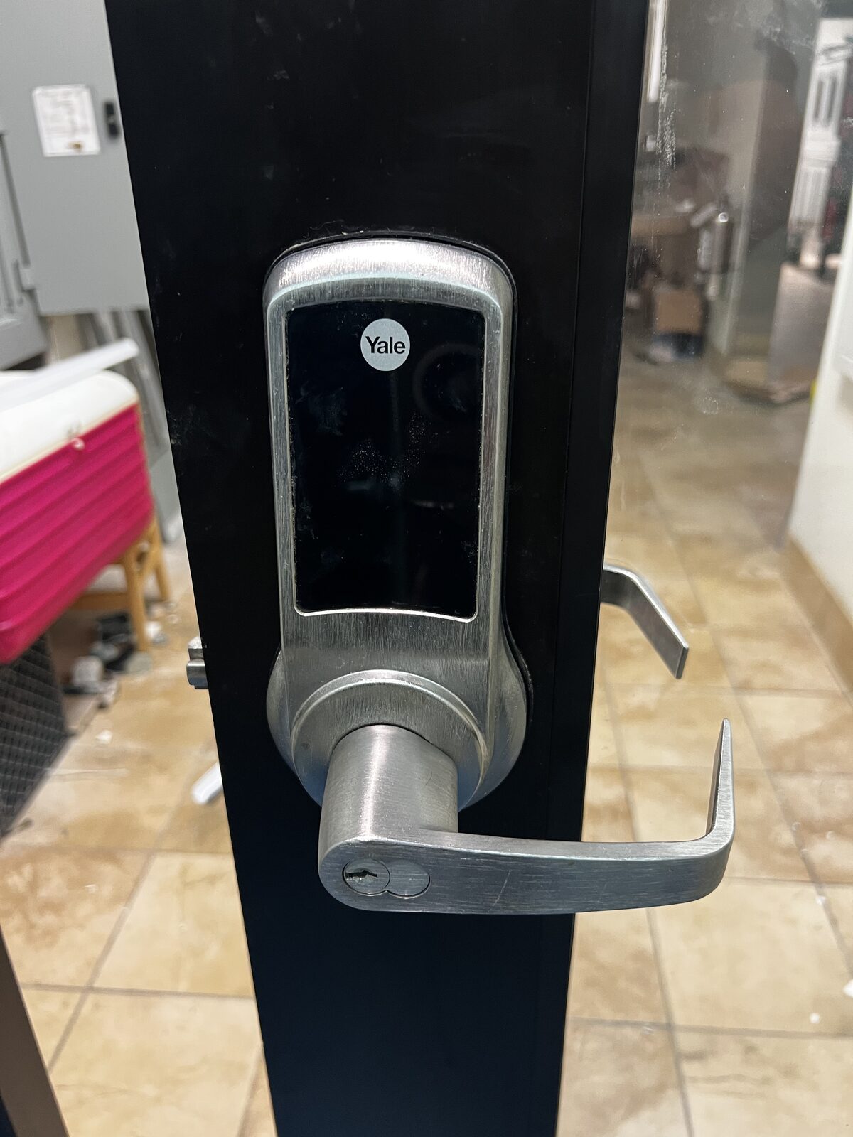 Yale keypad smart lock installed on an entry door in Houston TX